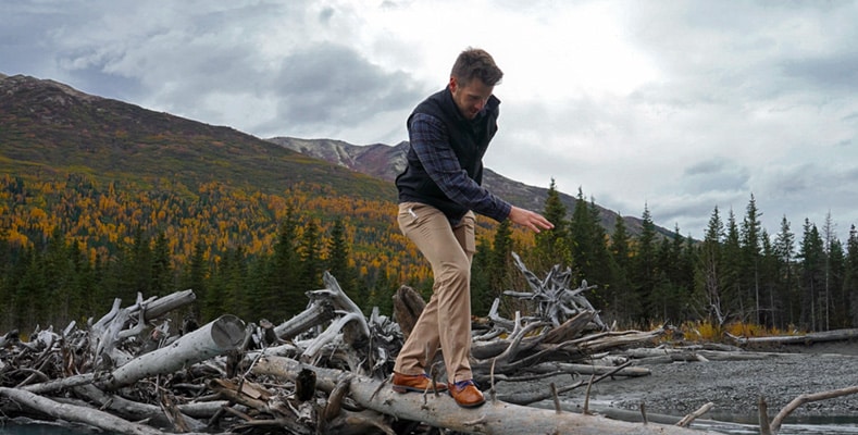 Ken Okonek crossing a river