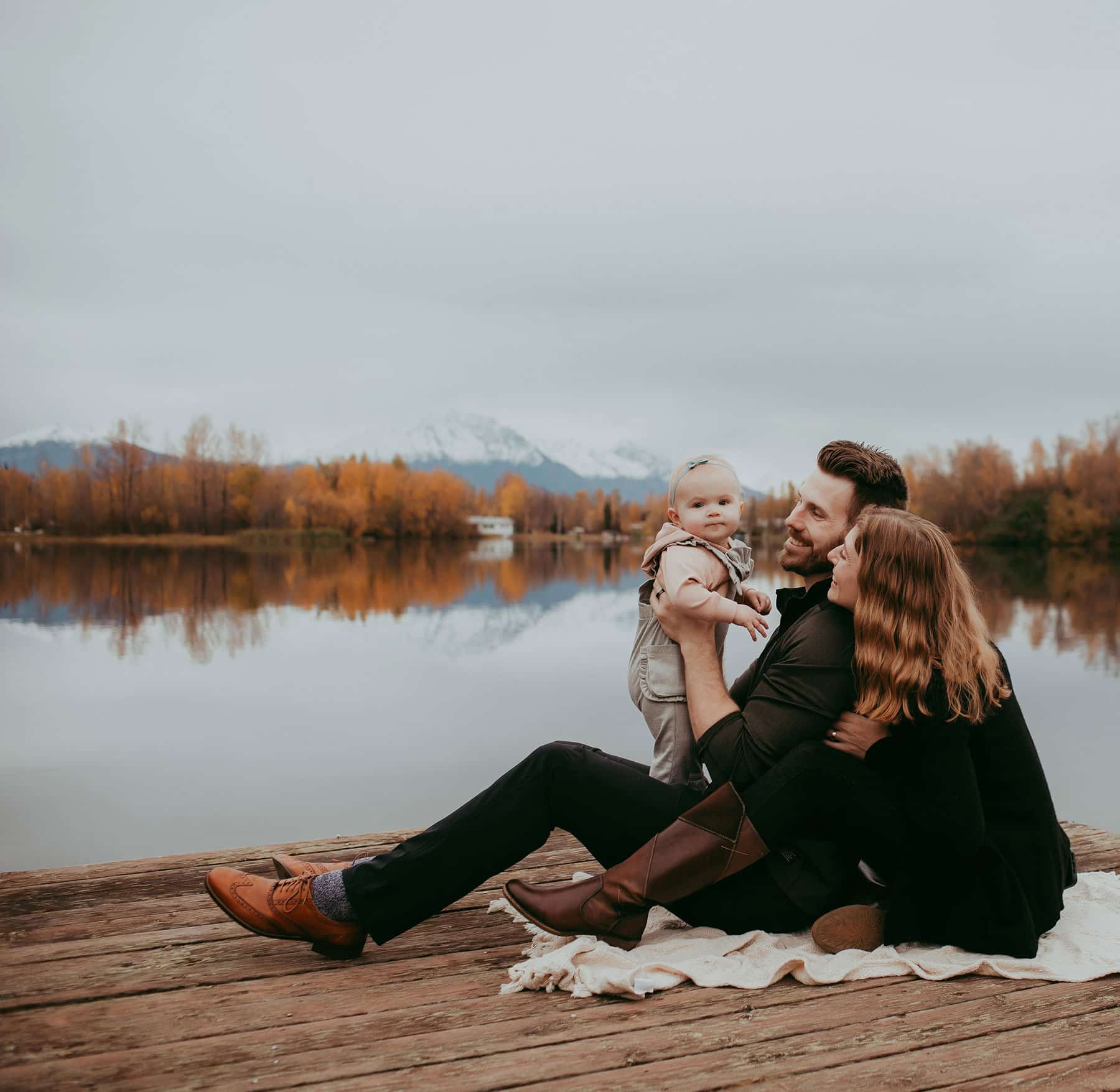 Ken Okonek with wife and baby daughter